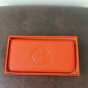 Monogram Orange H Long Zippy Wallet